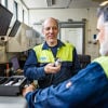 A Stena Aluminium employee examining some material